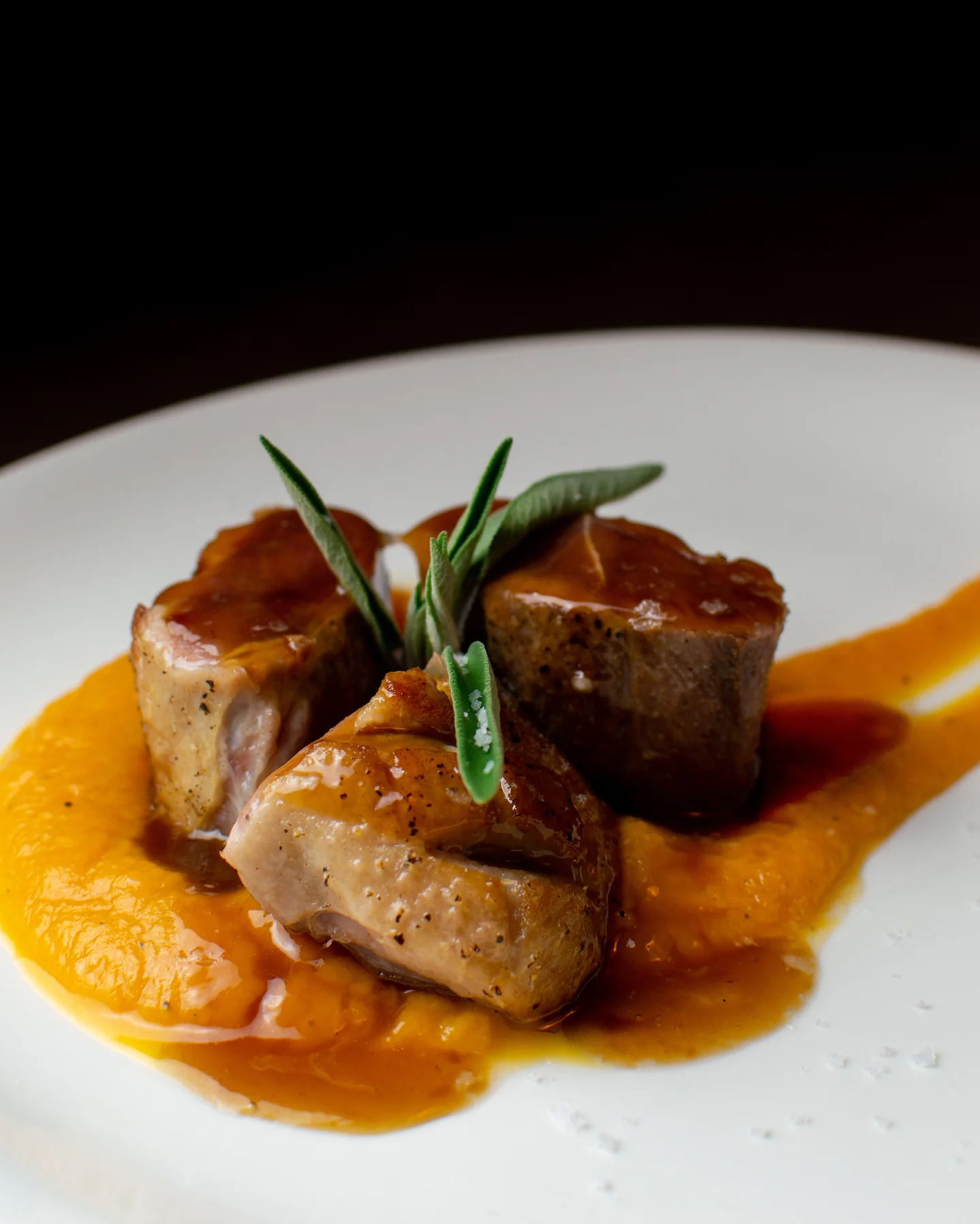 Magret d’ànec amb puré de carbassa i ratafia Rufaca